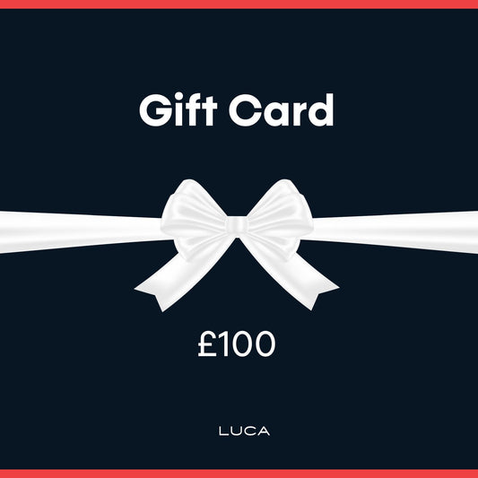 Graphic-representing-a-LUCA-Gift- Card-valued-at-£100-It-features-a- large-white-bow-on-a-ribbon-across-a-dark-blue-background- framed-by-a-red-border