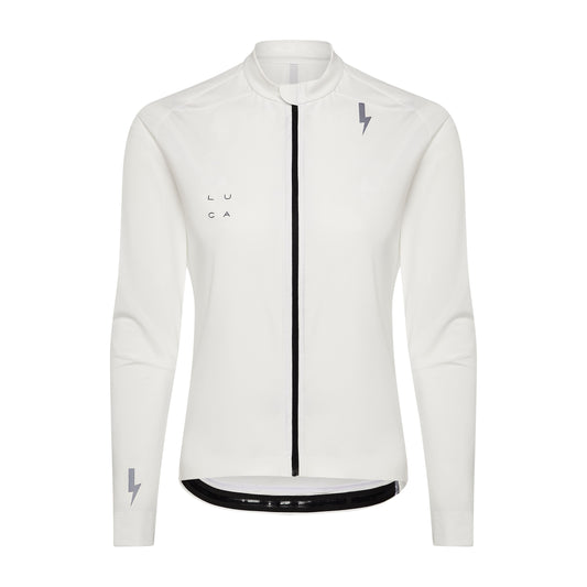 Front-view-of-the-white-long-sleeve-athletic-jersey-with-a-full-blck-zip-and-high-collar-The-top-features-gray-LUCA-chest-branding-logo-and-reflective-lighting-bolt-sign-on-the-upper-chest-and-lower-sleeve