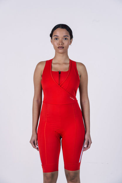 Full-body-studio-shot-of-a-woman- wearing-a-bright-red-short-sleeve- cycling-race-suit-with-white-side- panels