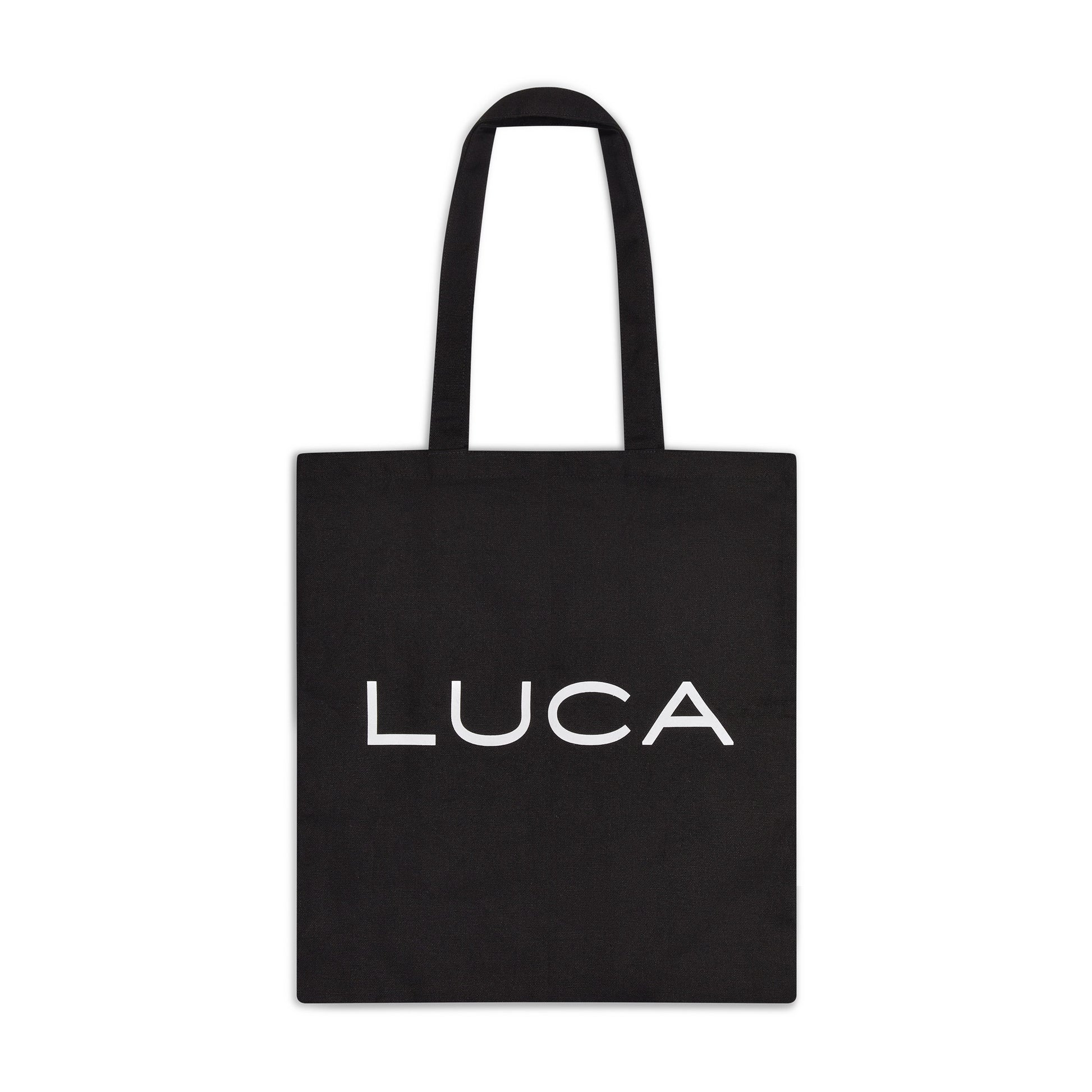 Black-cotton-canvas-tote-bag-with- white-LUCA-logo-printed-on-the- front-with-shoulder-straps-on-a- white-background